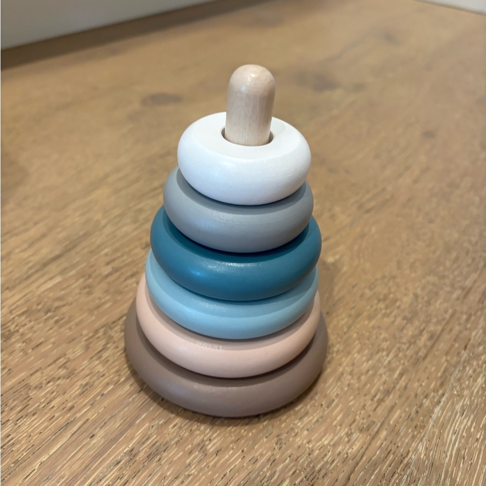 Stacking Ring Toy in Blue, Gray, White, and Brown wood